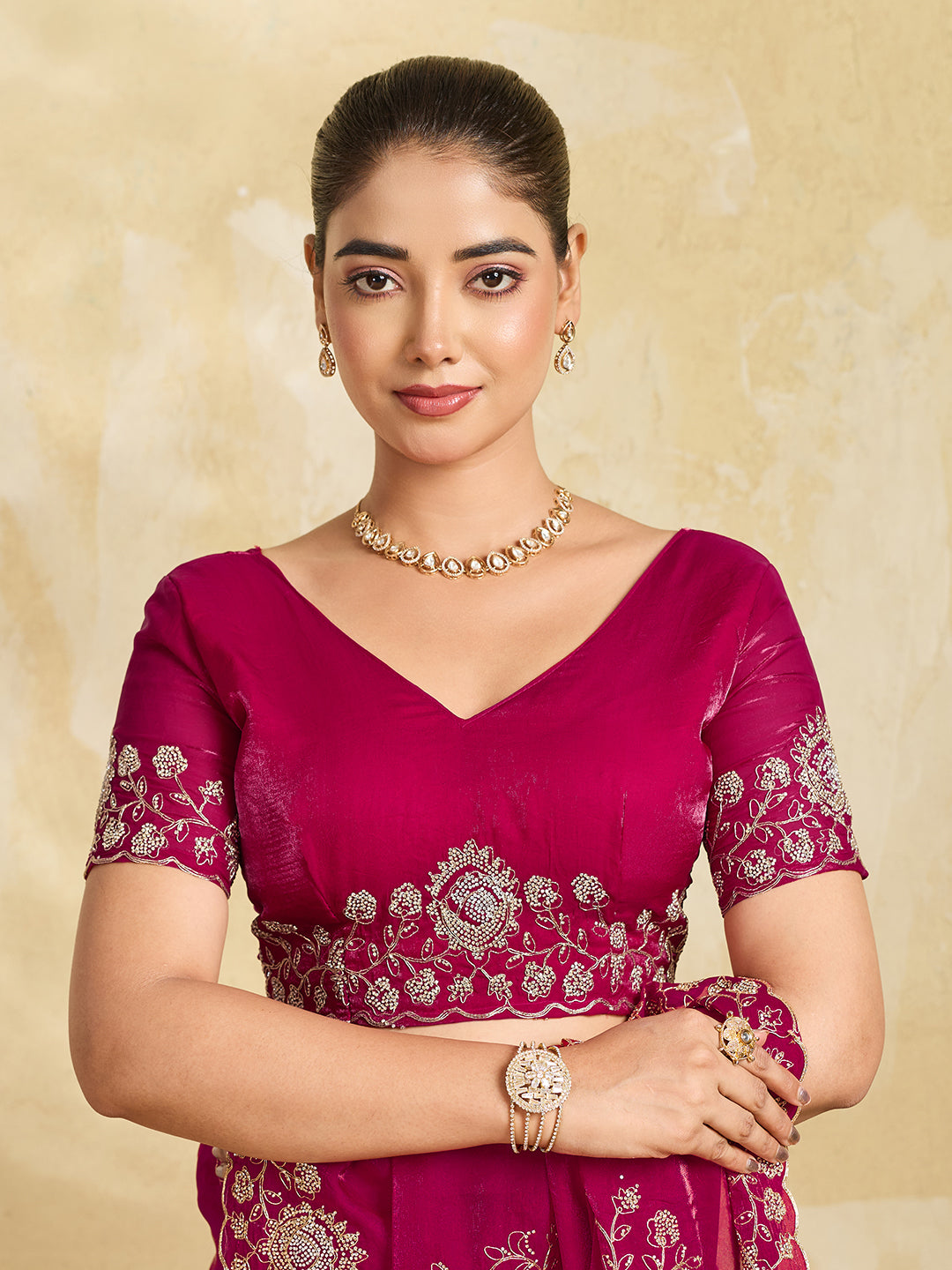 Rani Pink Georgette Saree with Gold Zari Floral Embroidery and Scalloped Border