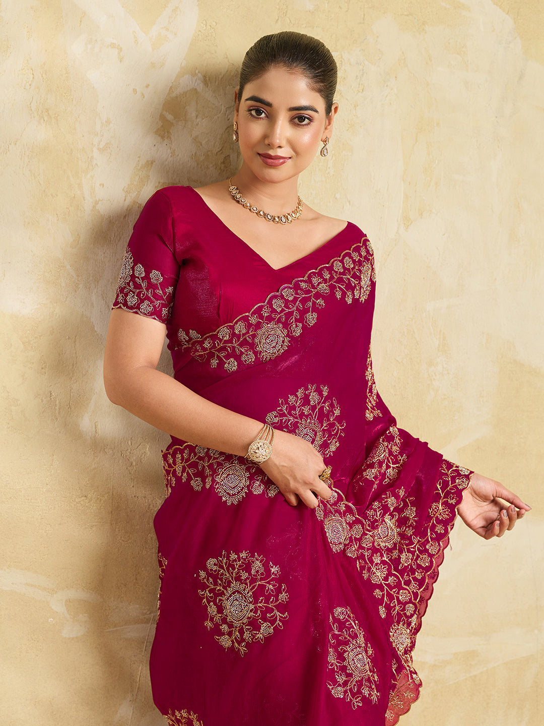 Rani Pink Georgette Saree with Gold Zari Floral Embroidery and Scalloped Border