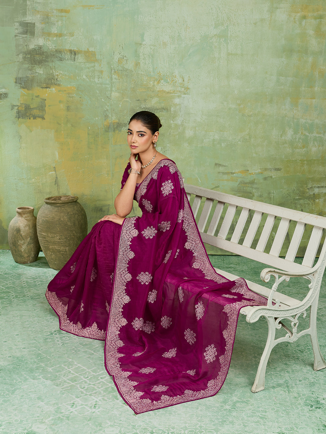 Wine Net Saree with Silver Floral Medallion Embroidery