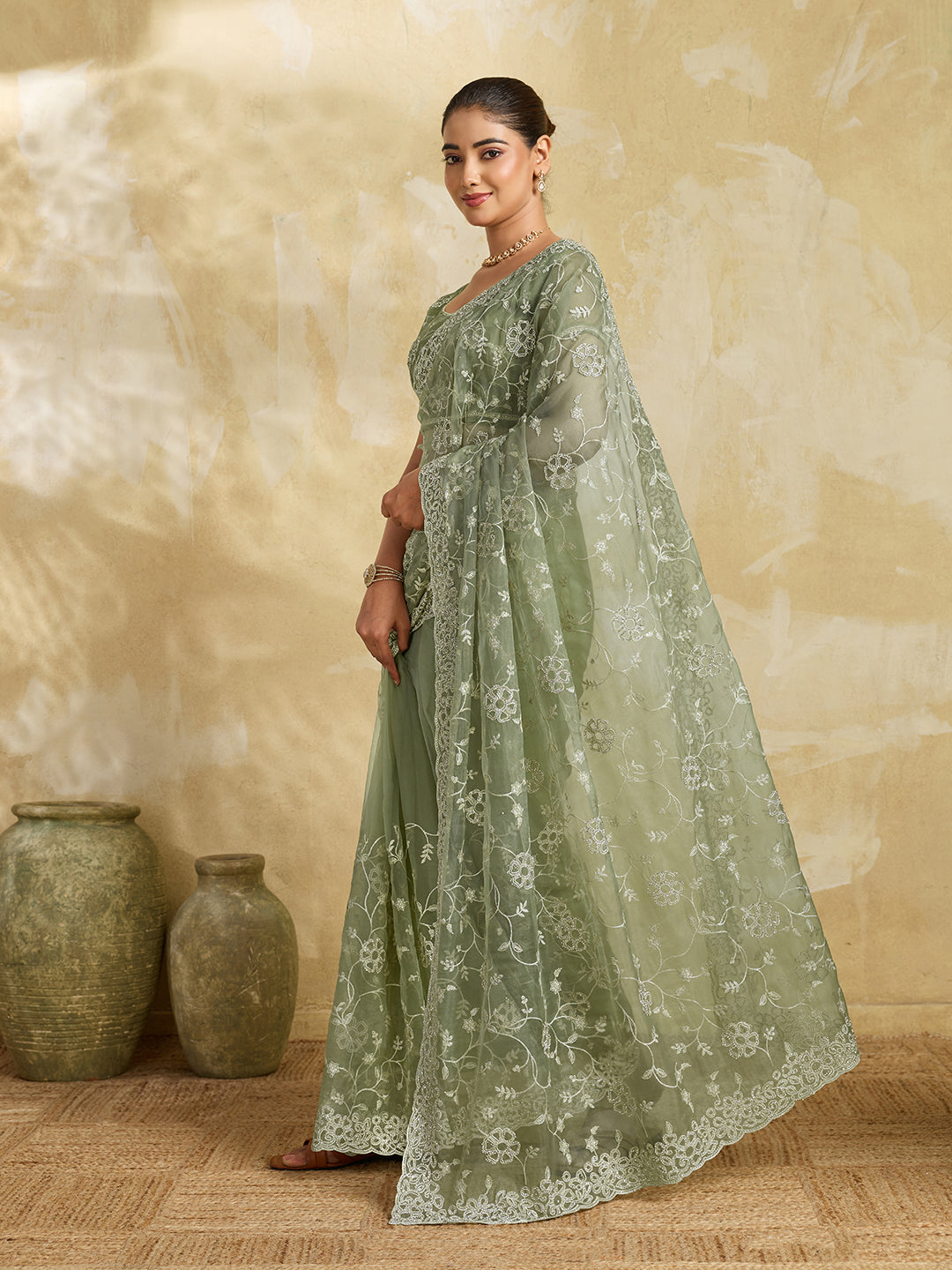 Pista Green Net Saree with Silver Floral Thread Embroidery