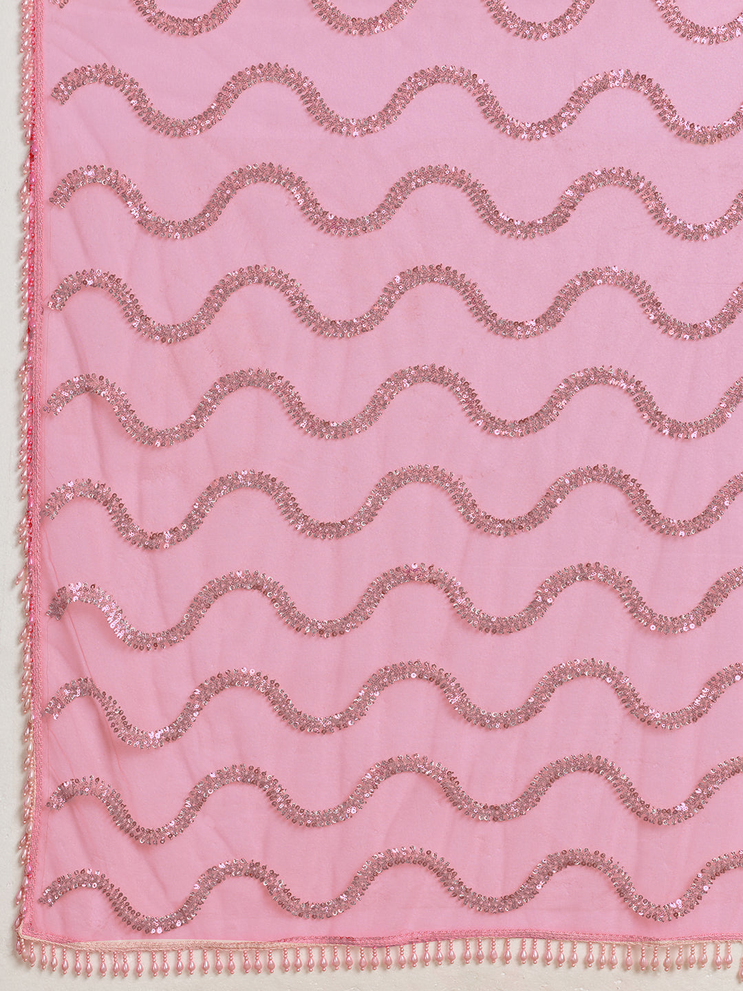 Pink Net Saree with Silver Sequin Wave Embroidery and Tasseled Border